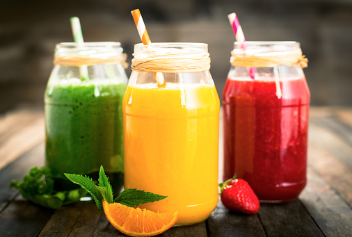 Healthy fruit and vegetable smoothies in jars