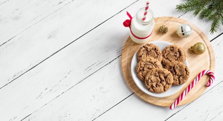 a plate of cookies with milk and candy cane. holiday cookie recipes