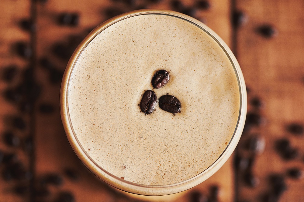 Espresso martini cocktail with coffee beans